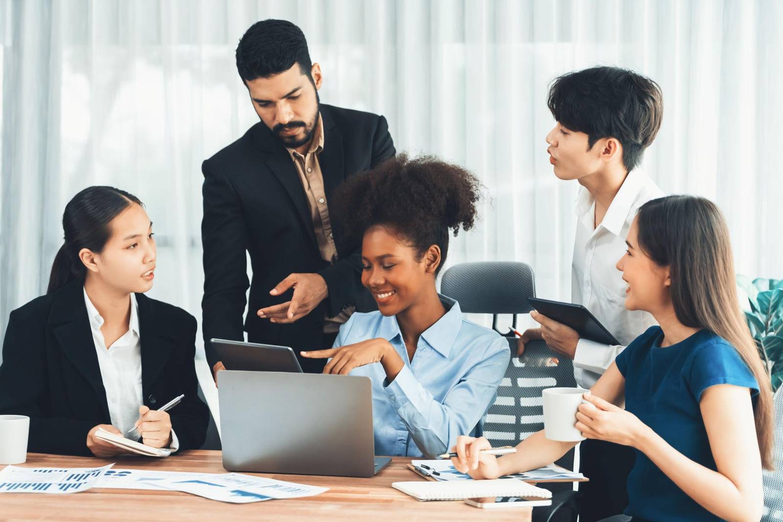 Data analyst in India working on dashboards and data visualisation tools in a modern office