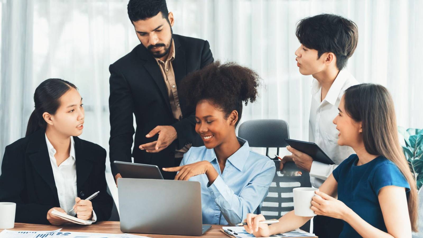 Data analyst in India working on dashboards and data visualisation tools in a modern office